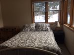 Queen size bed in guest room